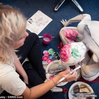 Paint a contortionist? Piece of cake! Body artist creates a clever tea party to celebrate Macmillan charity event