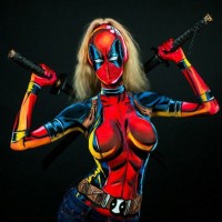 Woman transforms into incredible superheroes by painting costumes onto her body