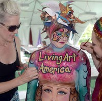 Artists paint model for first body art display at local Virginia festival