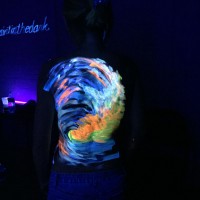 carry the ocean uv body painting - back